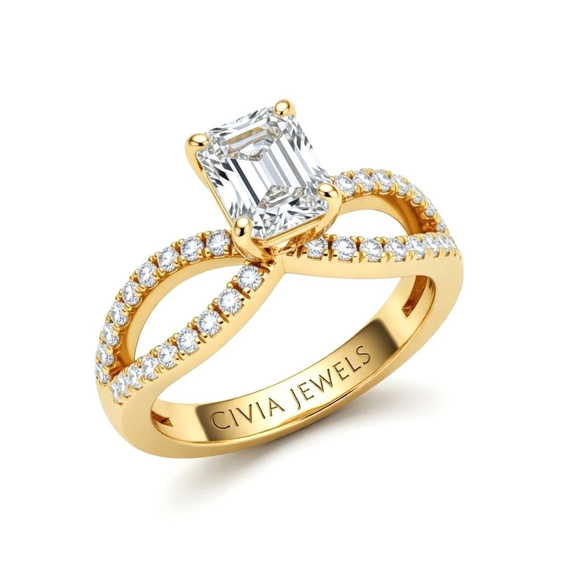 Yellow Gold Emerald Diamond Twisted Shank Engagement Ring With Four Prong Setting And Pavé Band