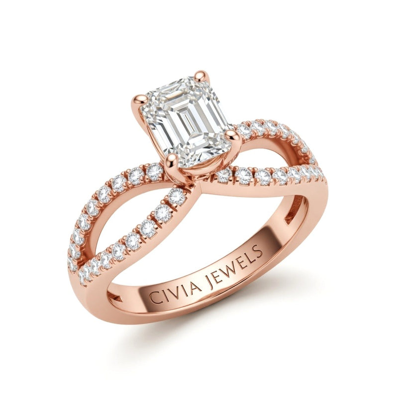 Rose Gold Emerald Diamond Twisted Shank Engagement Ring With Four Prong Setting And Pavé Band