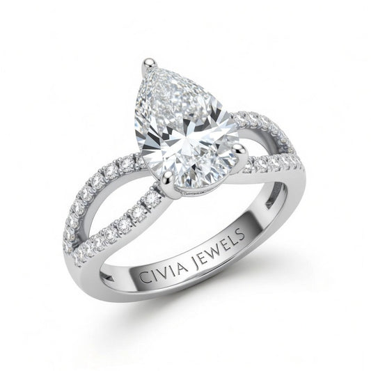 Silver Pear Diamond Twisted Shank Engagement Ring With Four Prong Setting And Pavé Band