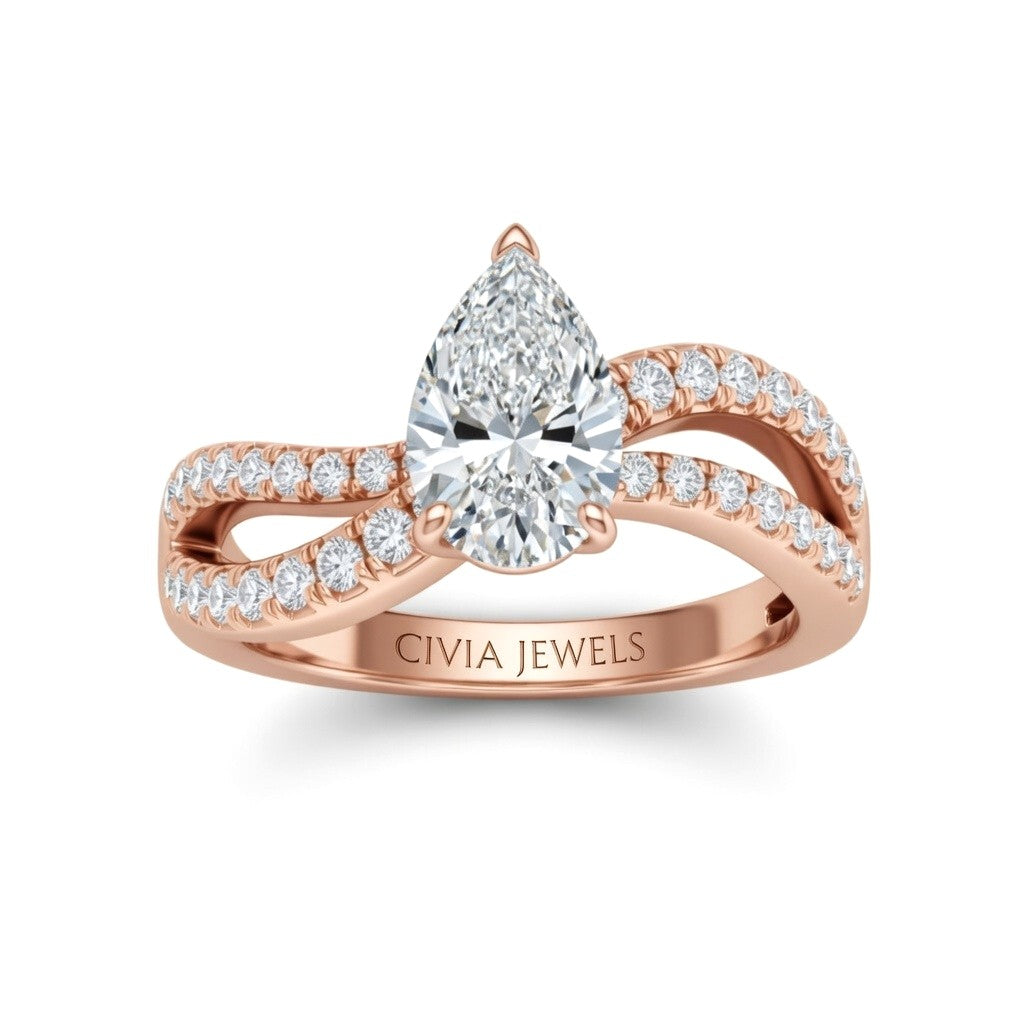Rose Gold Pear Diamond Twisted Shank Engagement Ring With Four Prong Setting And Pavé Band