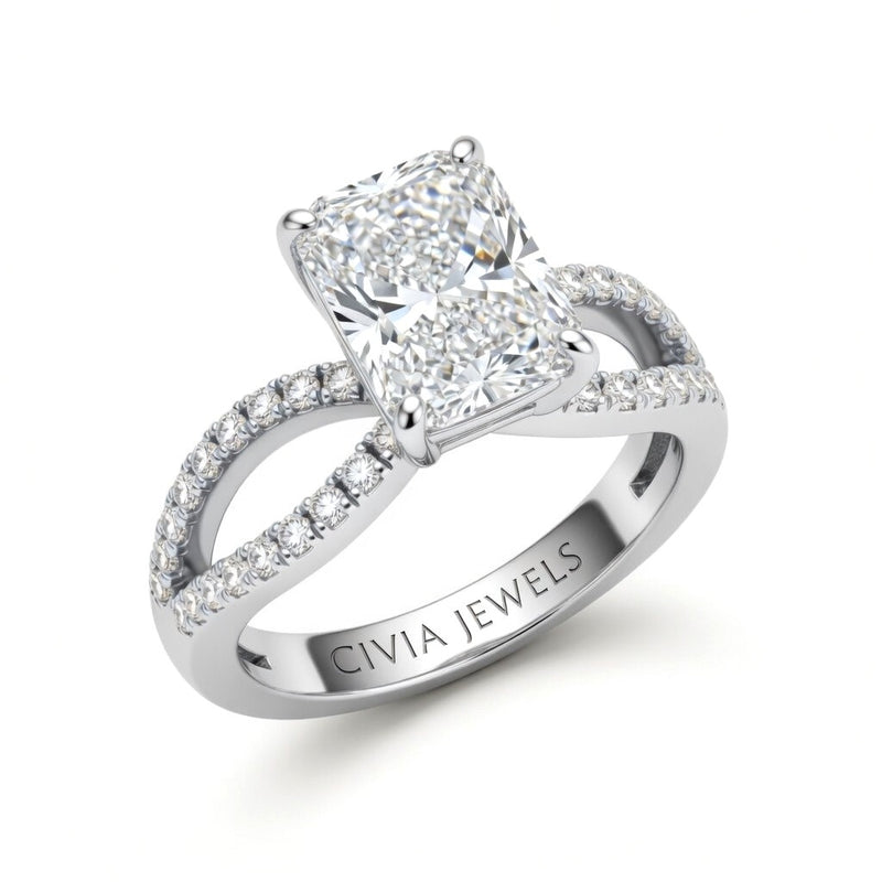 White Gold Radiant Diamond Twisted Shank Engagement Ring With Four Prong Setting And Pavé Band