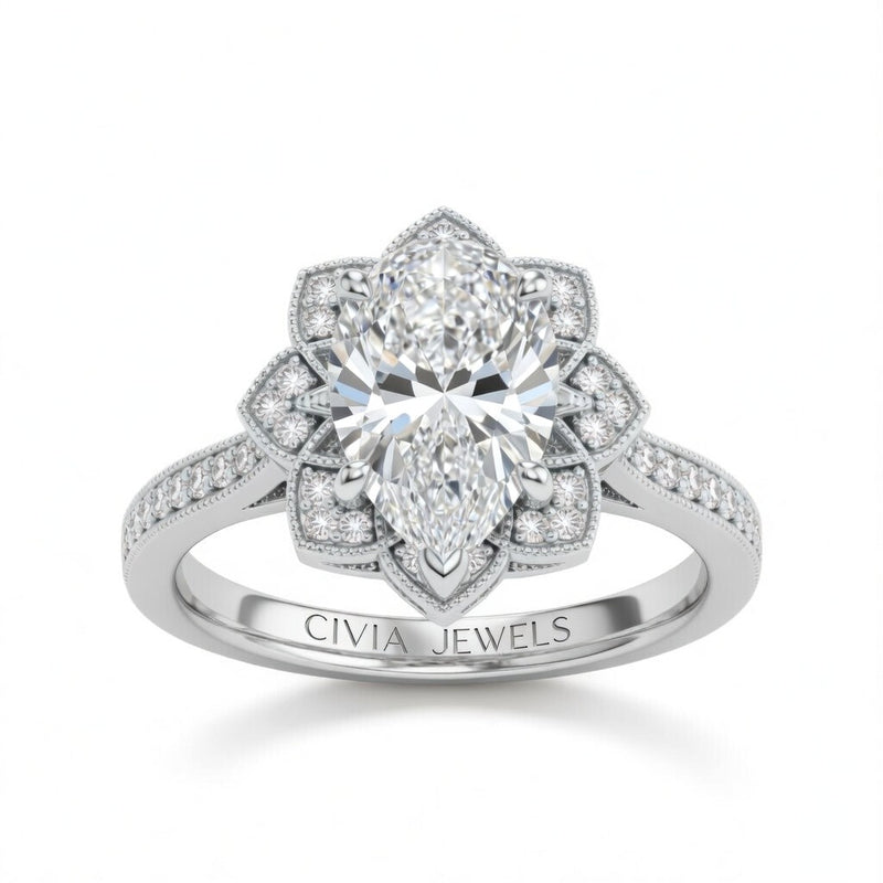 Silver Pear Diamond Vintage Halo Engagement Ring With Four Prong Setting And Pavé Band
