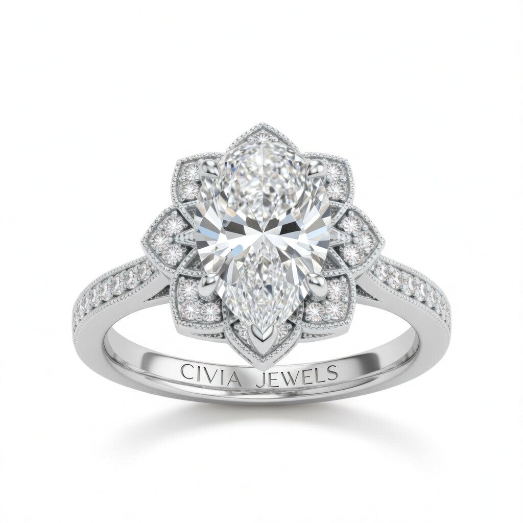 Silver Pear Diamond Vintage Halo Engagement Ring With Four Prong Setting And Pavé Band