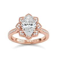 Rose Gold Pear Diamond Vintage Halo Engagement Ring With Four Prong Setting And Pavé Band