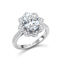 White Gold Round Diamond Vintage Halo Engagement Ring With Four Prong Setting And Pavé Band
