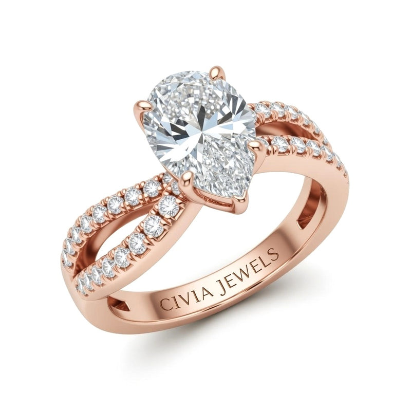 Rose Gold Pear Diamond Twisted Shank Engagement Ring With Four Prong Setting And Pavé Side Bands