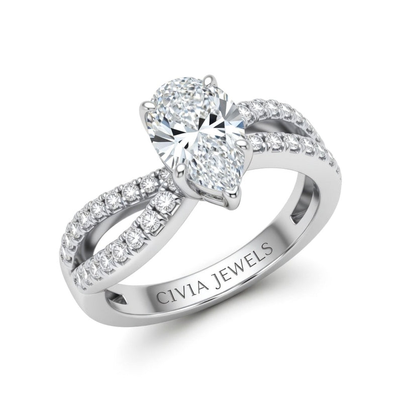 White Gold Pear Diamond Twisted Shank Engagement Ring With Four Prong Setting And Pavé Side Bands