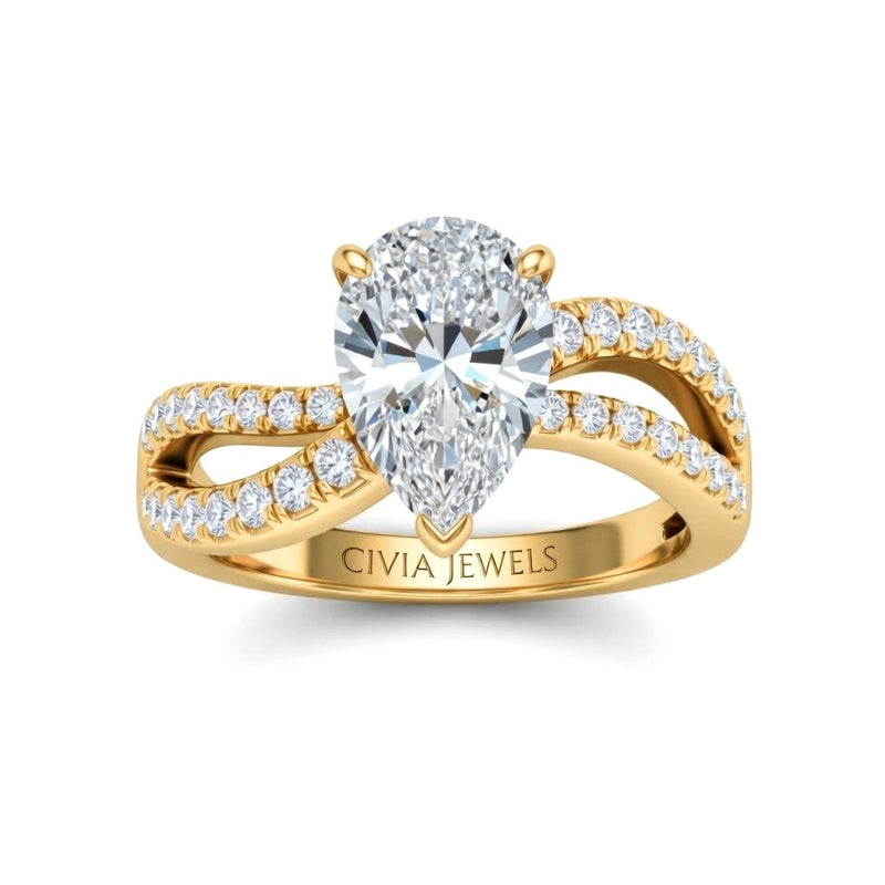 Yellow Gold Pear Diamond Twisted Shank Engagement Ring With Four Prong Setting And Pavé Side Bands