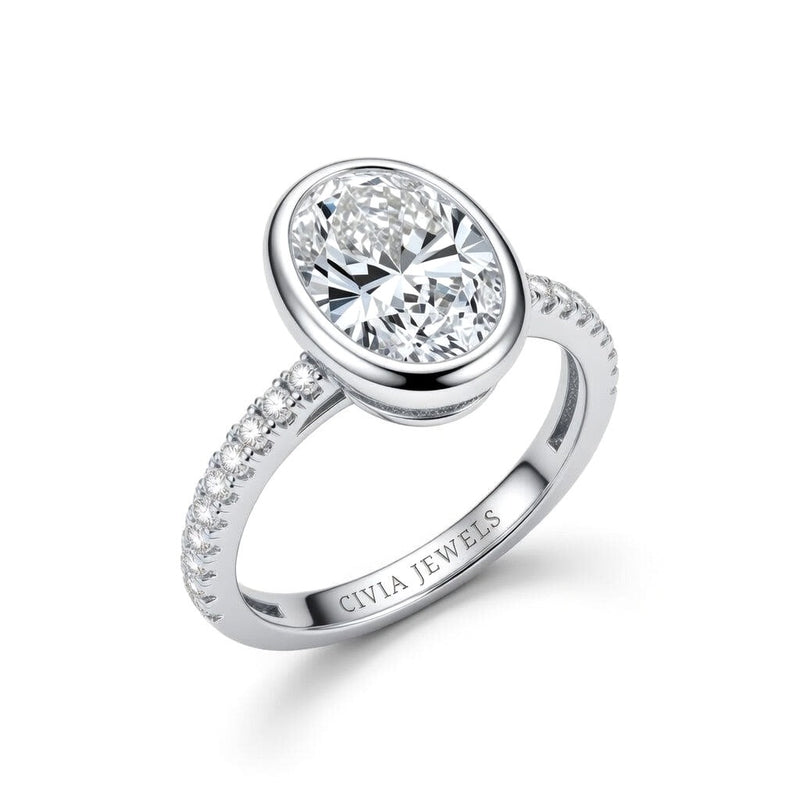 White Gold Oval Cut Bezel Set Solitaire With Diamond Pavé Classic Band Engagement Ring