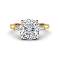 Yellow Gold Cushion Cut Three Stone Engagement Ring With Tapered Baguette Side Diamonds And Classic Four Prong Setting