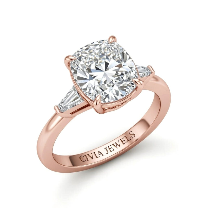 Rose Gold Cushion Cut Three Stone Engagement Ring With Tapered Baguette Side Diamonds And Classic Four Prong Setting