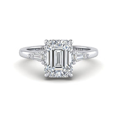 White Gold Emerald Cut Three Stone Engagement Ring With Tapered Baguette Side Diamonds And Classic Four Prong Setting