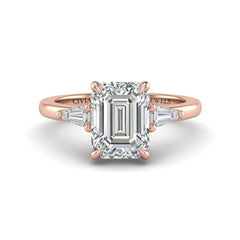 Rose Gold Emerald Cut Three Stone Engagement Ring With Tapered Baguette Side Diamonds And Classic Four Prong Setting
