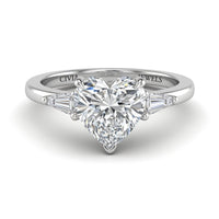 Silver Heart Cut Three Stone Engagement Ring With Tapered Baguette Side Diamonds And Classic Four Prong Setting