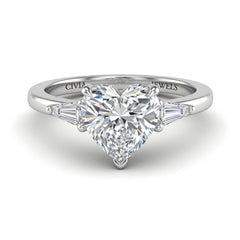 Silver Heart Cut Three Stone Engagement Ring With Tapered Baguette Side Diamonds And Classic Four Prong Setting