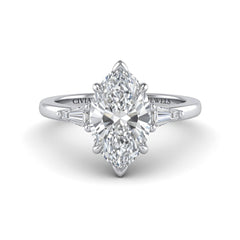 Silver Marquise Cut Three Stone Engagement Ring With Tapered Baguette Side Diamonds And Classic Four Prong Setting