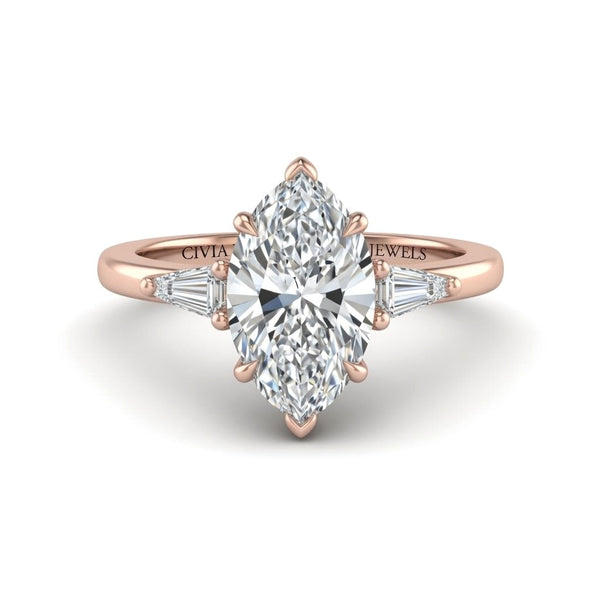 Rose Gold Marquise Cut Three Stone Engagement Ring With Tapered Baguette Side Diamonds And Classic Four Prong Setting