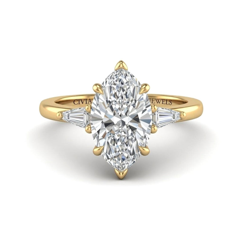 Yellow Gold Marquise Cut Three Stone Engagement Ring With Tapered Baguette Side Diamonds And Classic Four Prong Setting