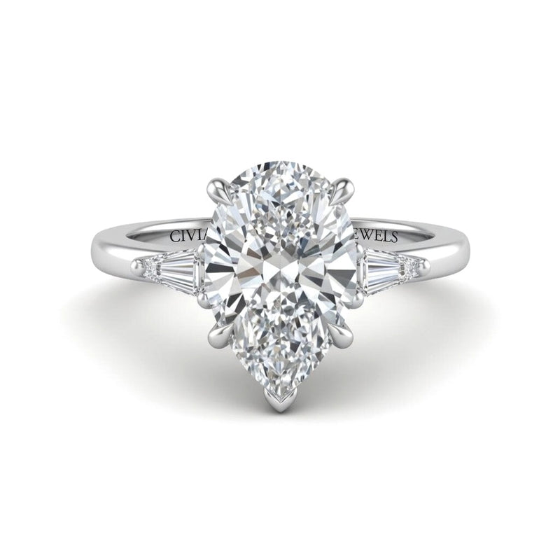 Silver Pear Cut Three Stone Engagement Ring With Tapered Baguette Side Diamonds And Classic Four Prong Setting