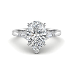 Silver Pear Cut Three Stone Engagement Ring With Tapered Baguette Side Diamonds And Classic Four Prong Setting