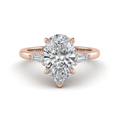 Rose Gold Pear Cut Three Stone Engagement Ring With Tapered Baguette Side Diamonds And Classic Four Prong Setting