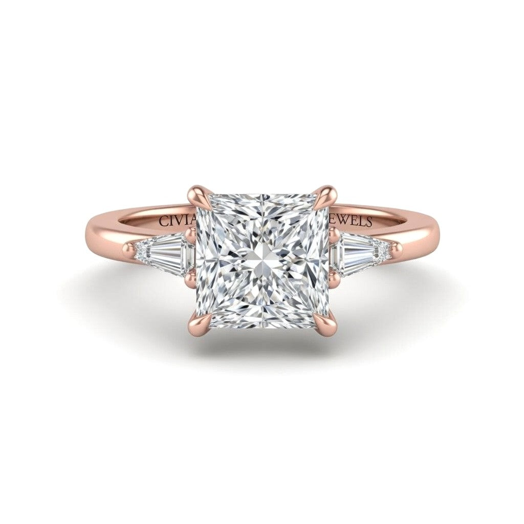 Rose Gold Princess Cut Three Stone Engagement Ring With Tapered Baguette Side Diamonds And Classic Four Prong Setting