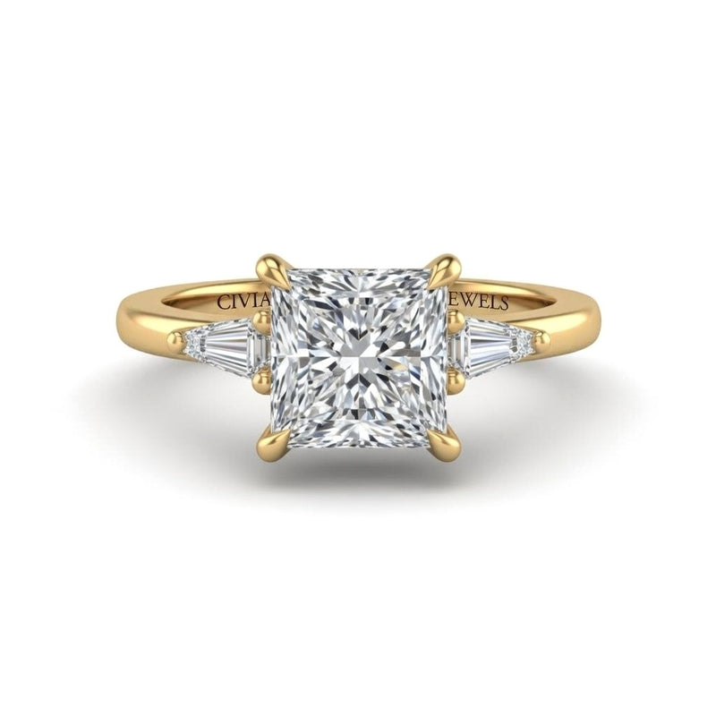Yellow Gold Princess Cut Three Stone Engagement Ring With Tapered Baguette Side Diamonds And Classic Four Prong Setting