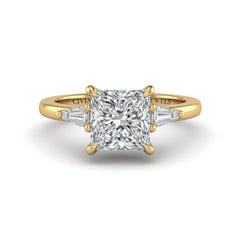 Yellow Gold Princess Cut Three Stone Engagement Ring With Tapered Baguette Side Diamonds And Classic Four Prong Setting