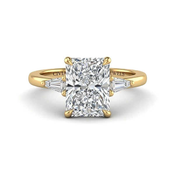 Yellow Gold Radiant Cut Three Stone Engagement Ring With Tapered Baguette Side Diamonds And Classic Four Prong Setting