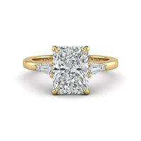 Yellow Gold Radiant Cut Three Stone Engagement Ring With Tapered Baguette Side Diamonds And Classic Four Prong Setting
