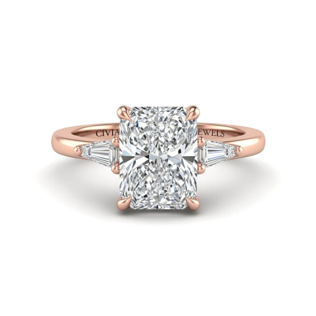 Rose Gold Radiant Cut Three Stone Engagement Ring With Tapered Baguette Side Diamonds And Classic Four Prong Setting