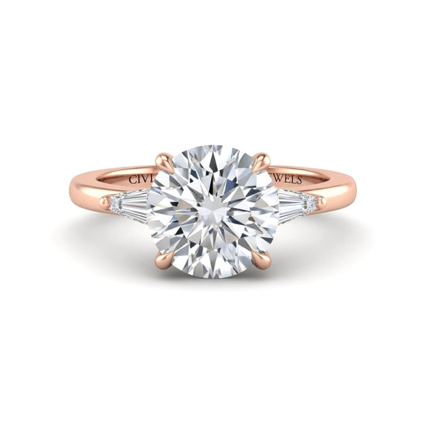 Rose Gold Round Cut Three Stone Engagement Ring With Tapered Baguette Side Diamonds And Classic Four Prong Setting
