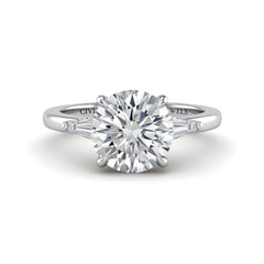 Silver Round Cut Three Stone Engagement Ring With Tapered Baguette Side Diamonds And Classic Four Prong Setting