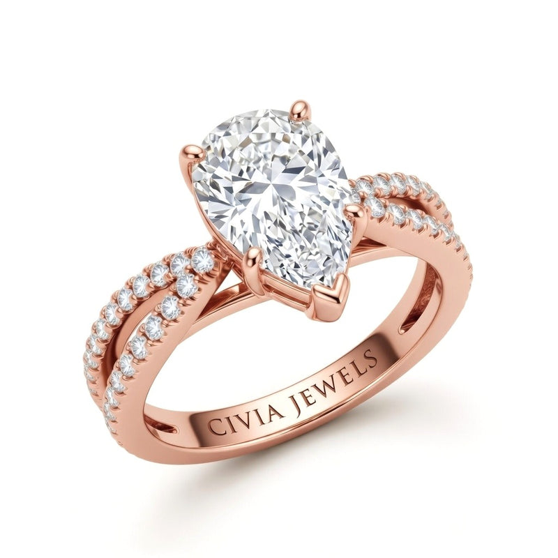Rose Gold Pear Cut Elevated Solitaire With Diamond Pavé Twisted Split Shank Engagement Ring