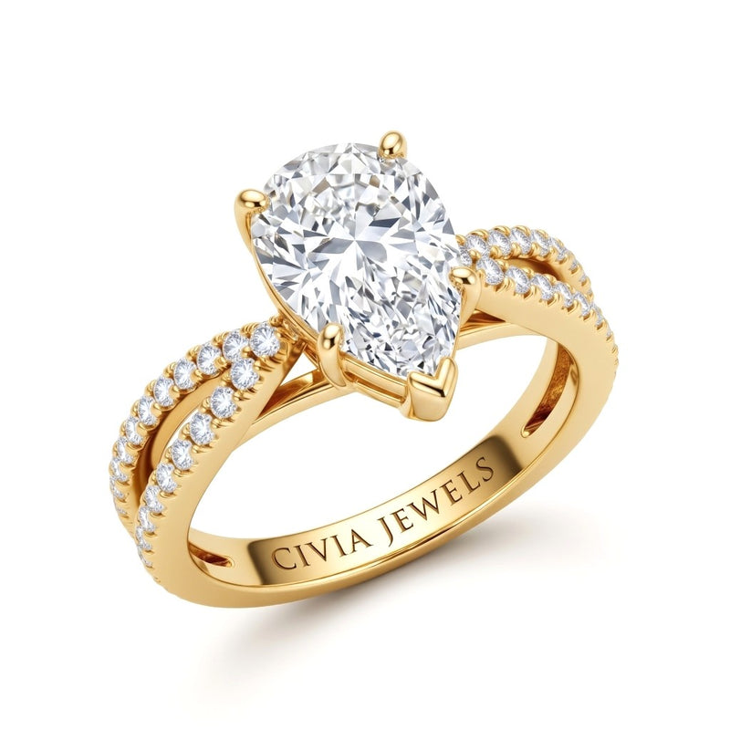 Yellow Gold Pear Cut Elevated Solitaire With Diamond Pavé Twisted Split Shank Engagement Ring