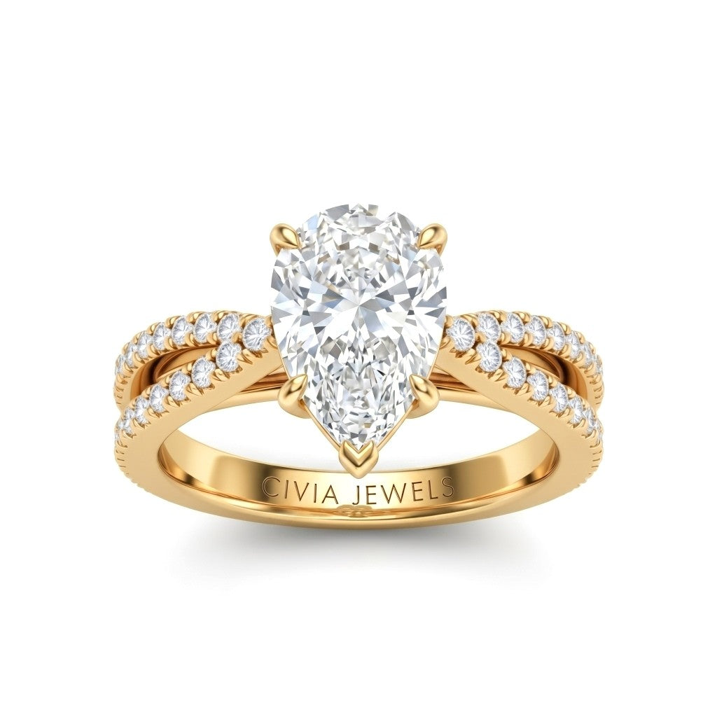 Yellow Gold Pear Cut Elevated Solitaire With Diamond Pavé Twisted Split Shank Engagement Ring