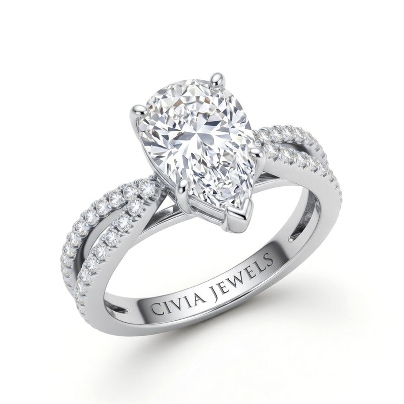 White Gold Pear Cut Elevated Solitaire With Diamond Pavé Twisted Split Shank Engagement Ring