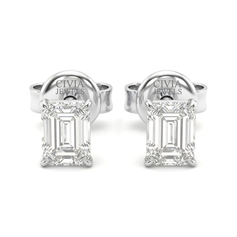 White Gold Emerald Cut Diamond Stud Earrings With Four Prong Setting