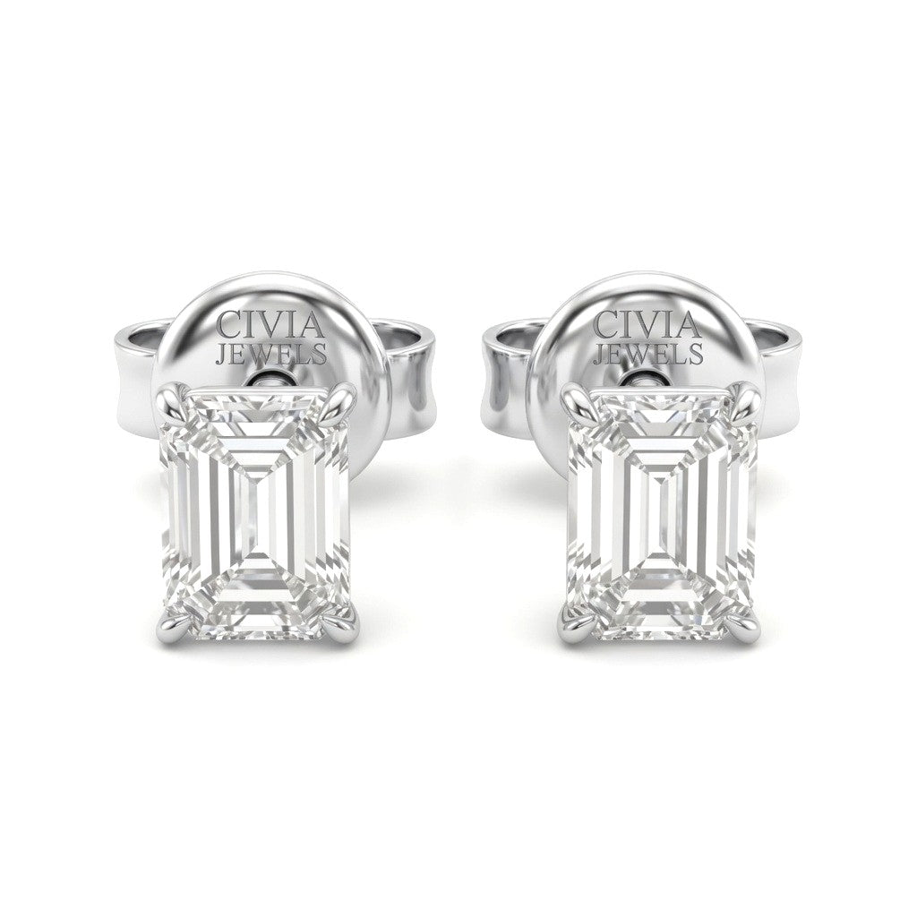 White Gold Emerald Cut Diamond Stud Earrings With Four Prong Setting