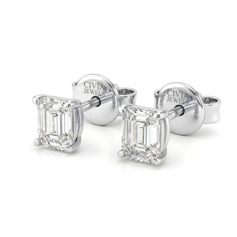 White Gold Emerald Cut Diamond Stud Earrings With Four Prong Setting