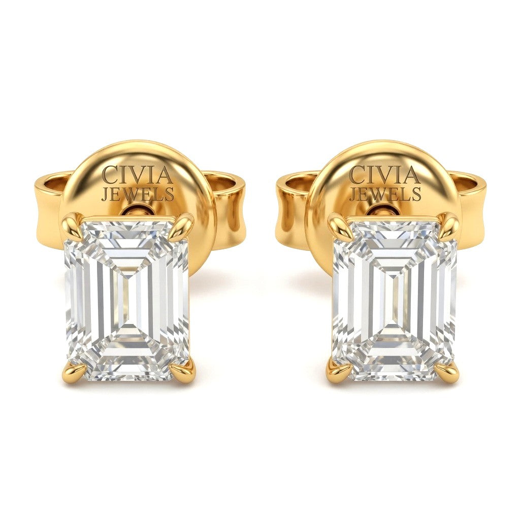 Yellow Gold Emerald Cut Diamond Stud Earrings With Four Prong Setting