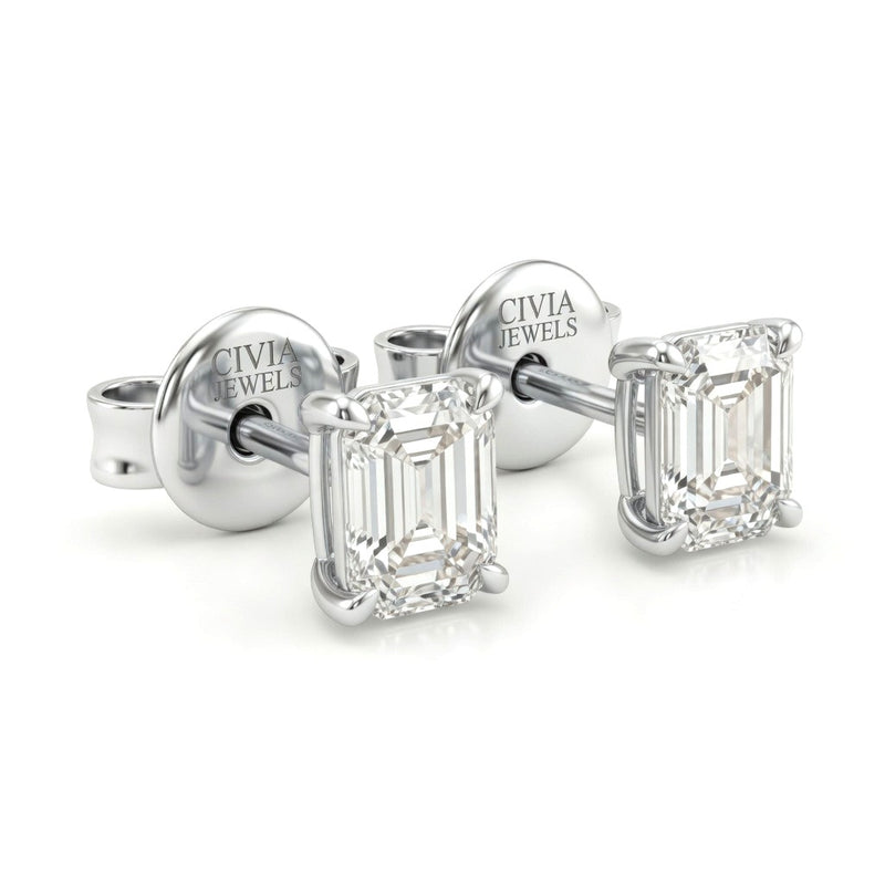 White Gold Emerald Cut Diamond Stud Earrings With Four Prong Setting