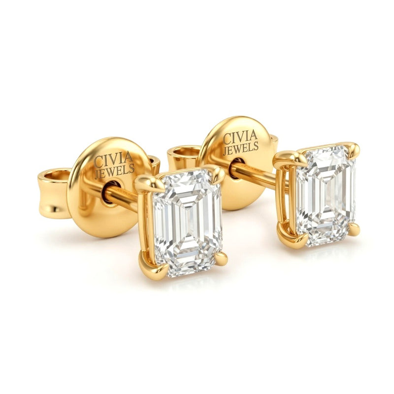 Yellow Gold Emerald Cut Diamond Stud Earrings With Four Prong Setting