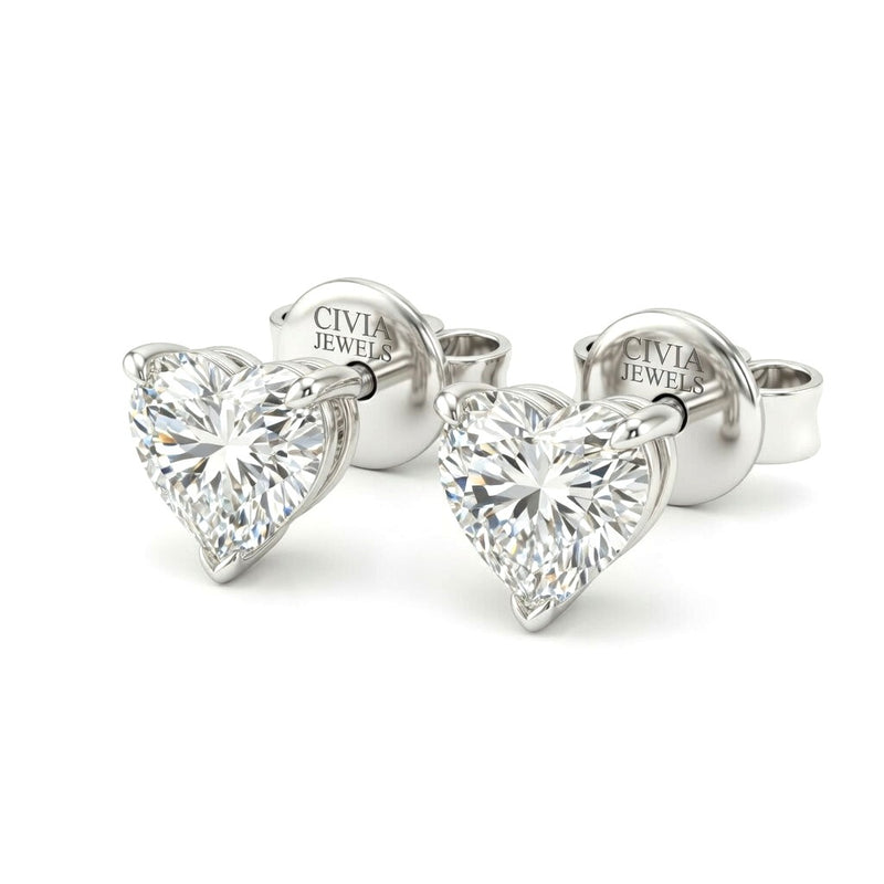 White Gold Heart Cut Diamond Stud Earrings With Four Prong Setting