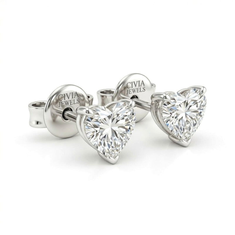 White Gold Heart Cut Diamond Stud Earrings With Four Prong Setting