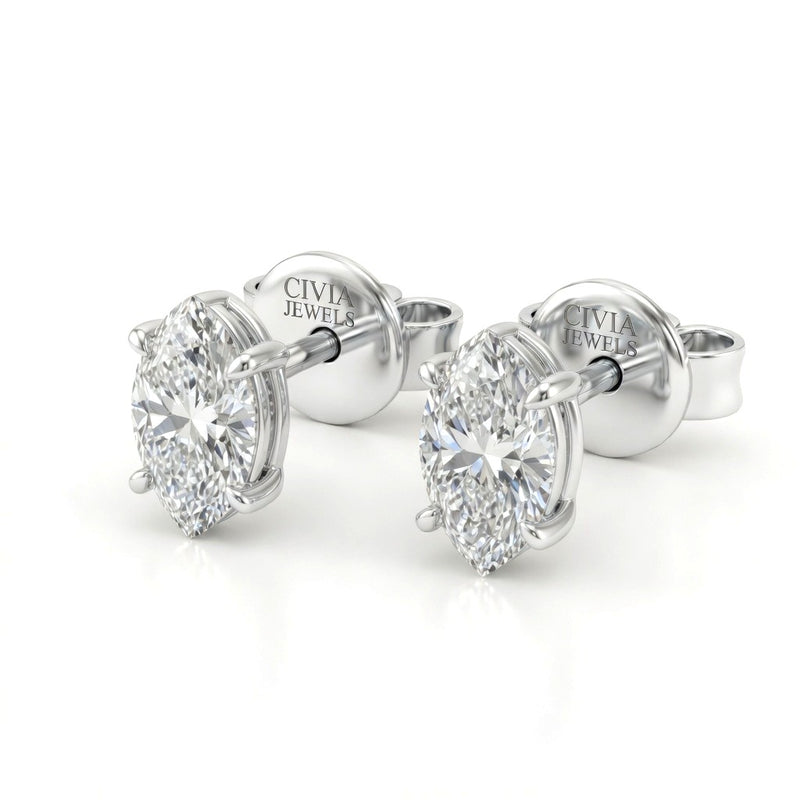 White Gold Marquise Cut Diamond Stud Earrings With Four Prong Setting