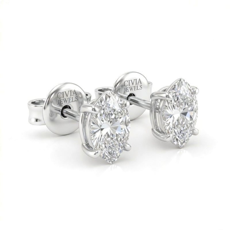 White Gold Marquise Cut Diamond Stud Earrings With Four Prong Setting