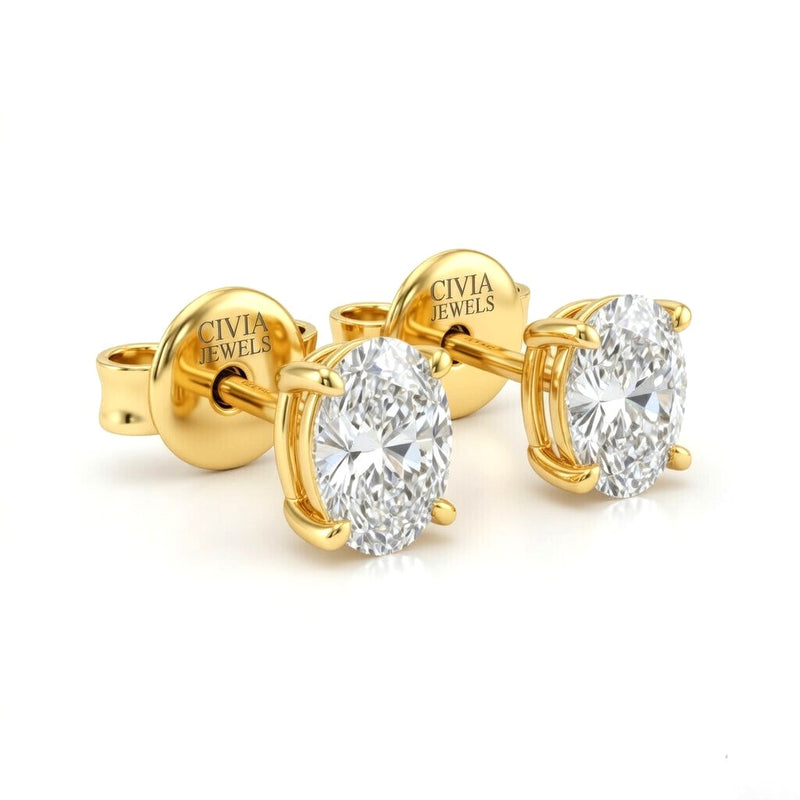 Yellow Gold Oval Cut Diamond Stud Earrings With Four Prong Setting