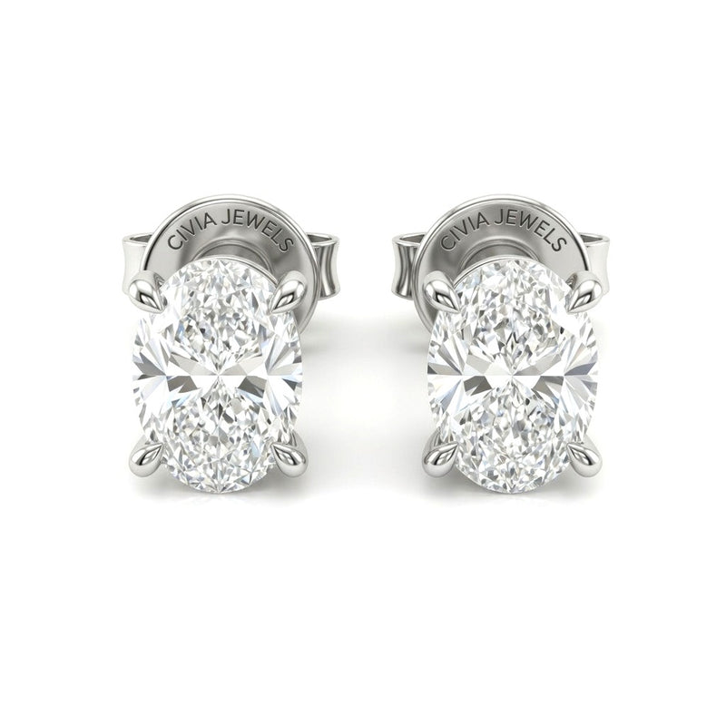 White Gold Oval Cut Diamond Stud Earrings With Four Prong Setting