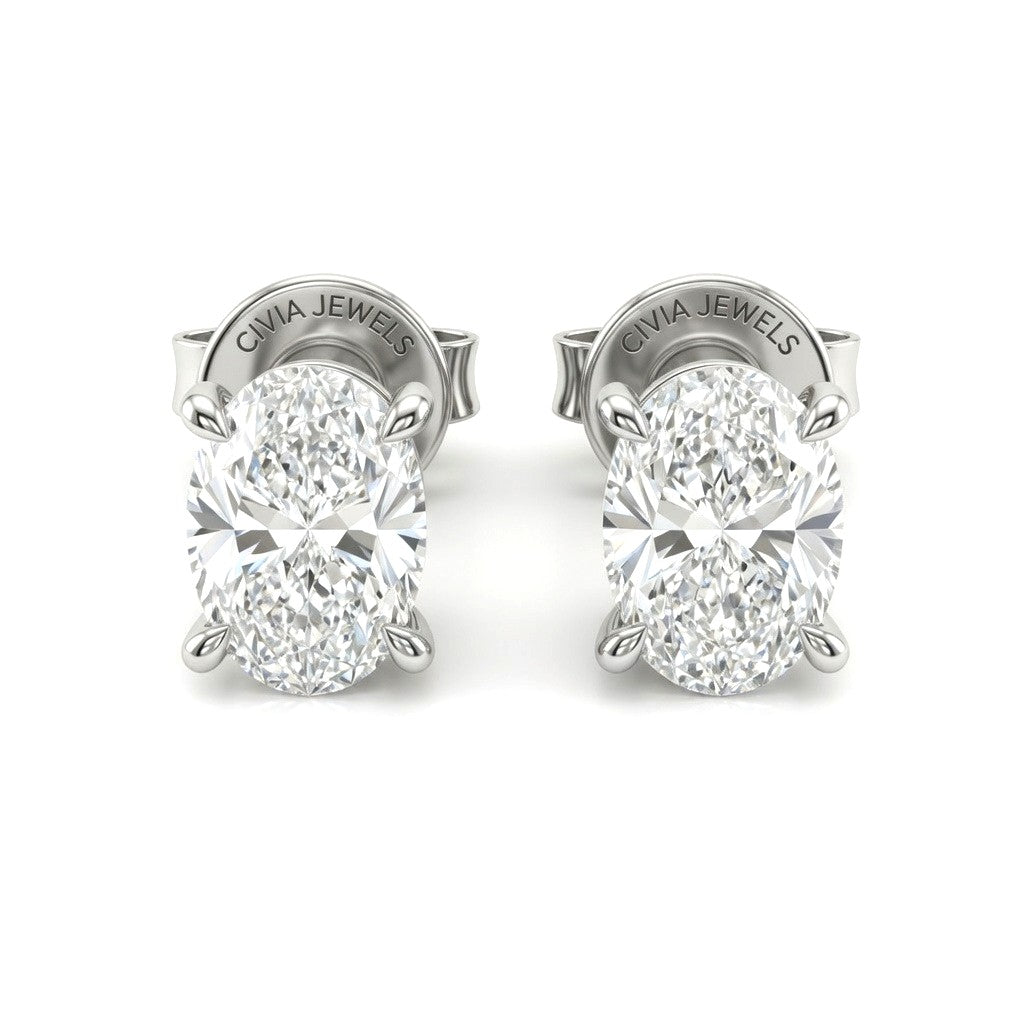 White Gold Oval Cut Diamond Stud Earrings With Four Prong Setting